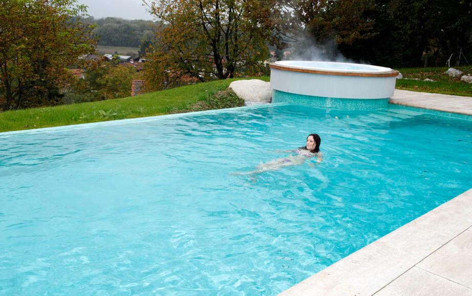 Private spa with outdoor swimming pool