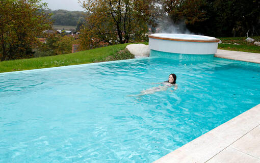 Private spa with outdoor swimming pool