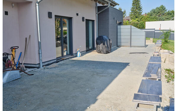 The compacted terrace substructure creates a level, stable foundation.